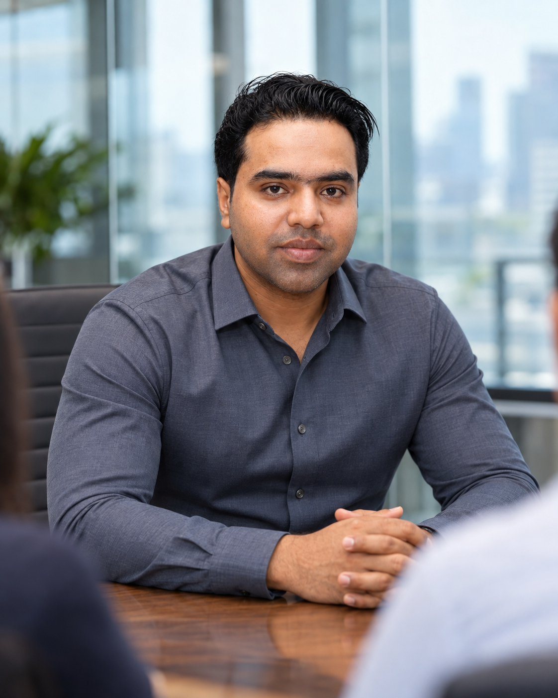 Syed Raheel Shahzad — Glass Boardroom Portrait Syed Raheel Shahzad — سيد راحيل شهزاد, author, philosopher, Founder and Group CEO of The Syed Group